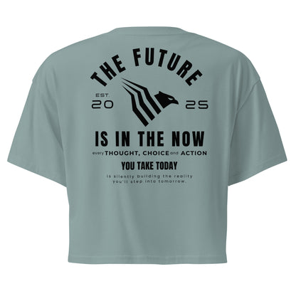 Light gray t-shirt with motivational text on the back against a white background. Women’s streetwear crop top that embodies ambition and confidence.